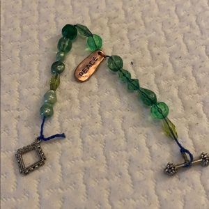 Green beaded ‘peace’ bracelet